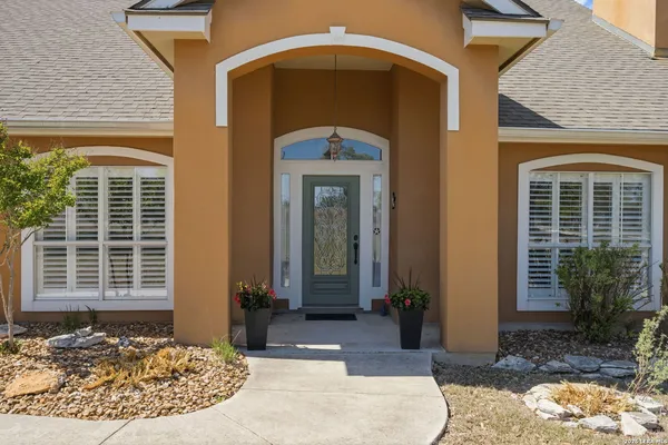 a front view of a house with a porch