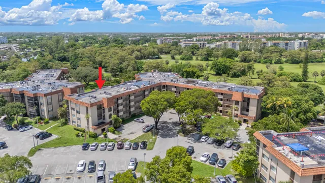 a view of a city with lots of trees