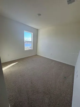 an empty room with a window