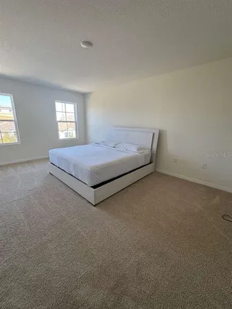 a living room with furniture and window