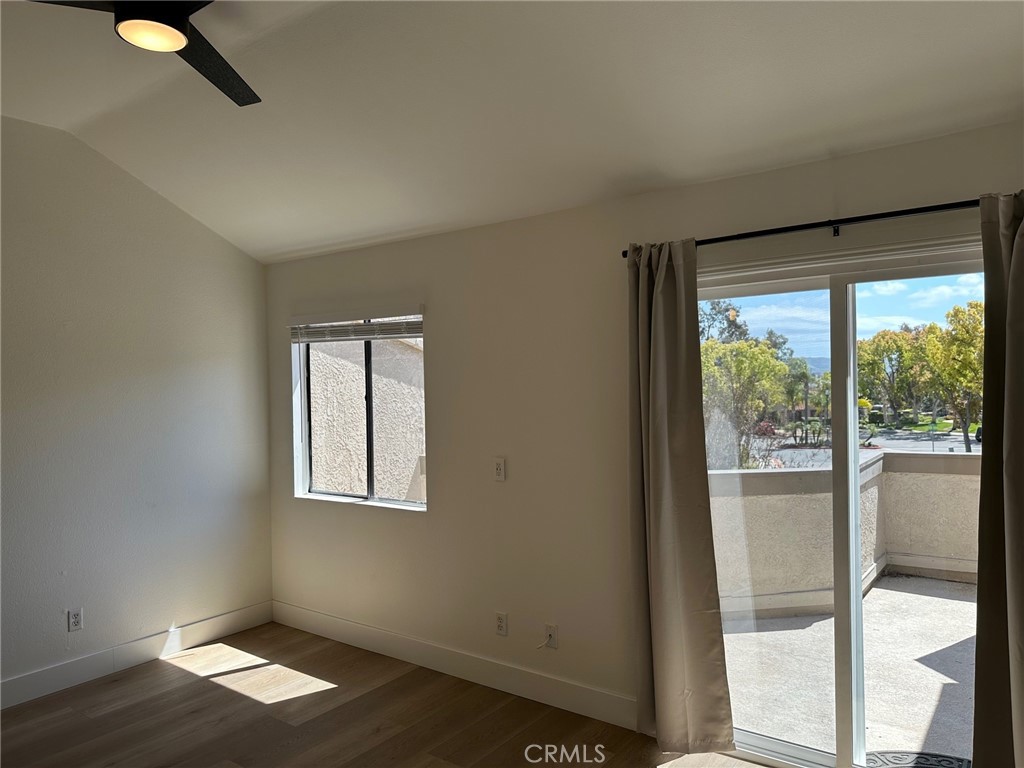 28142 Mariposa, Unit 154 Laguna Niguel, CA 92677 - Photo 13 of 35 a view of empty room with wooden floor and fan