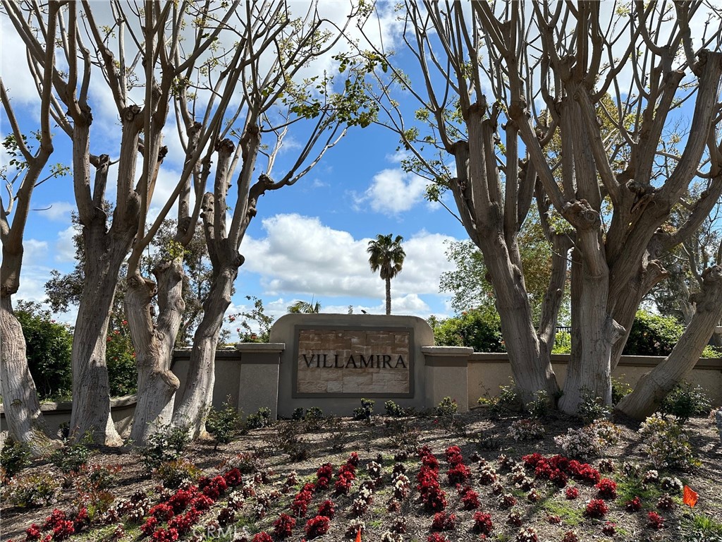 28142 Mariposa, Unit 154 Laguna Niguel, CA 92677 - Photo 2 of 35 a view of a pathway covered with large trees