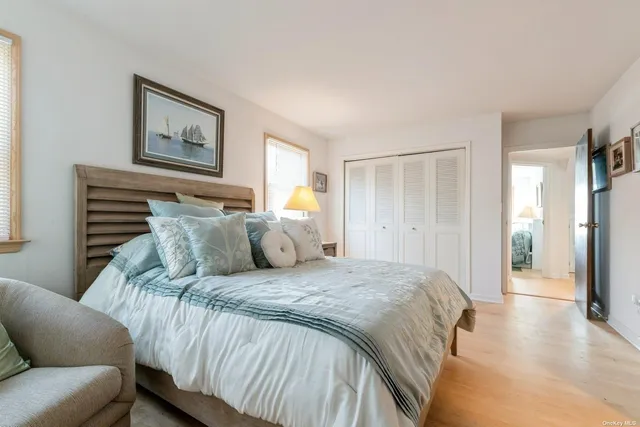 a bed room with a bed and a couch