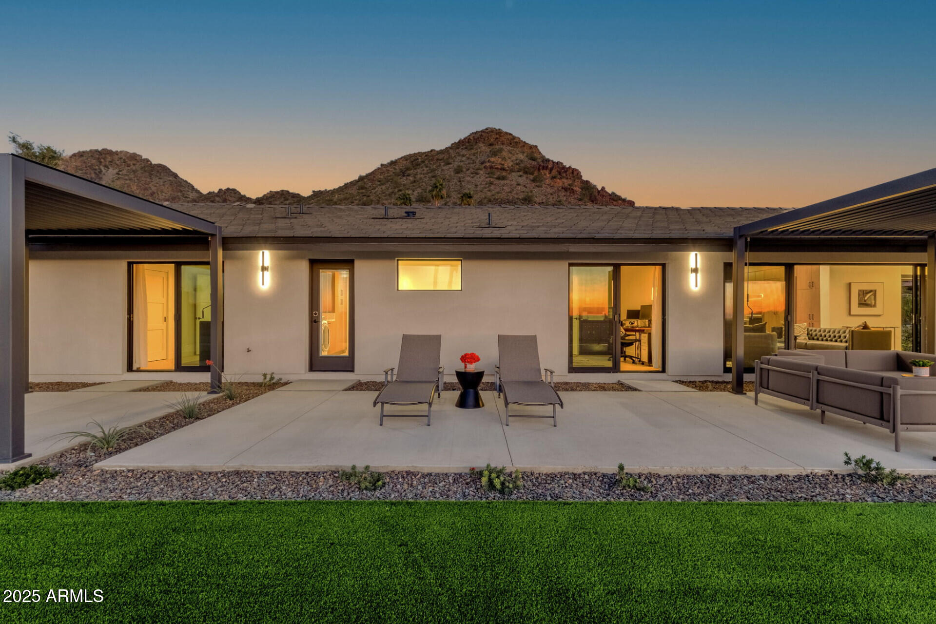 7112 North 23rd Way Phoenix, AZ 85020 - Photo 40 of 50 a group of people sitting in front of a house