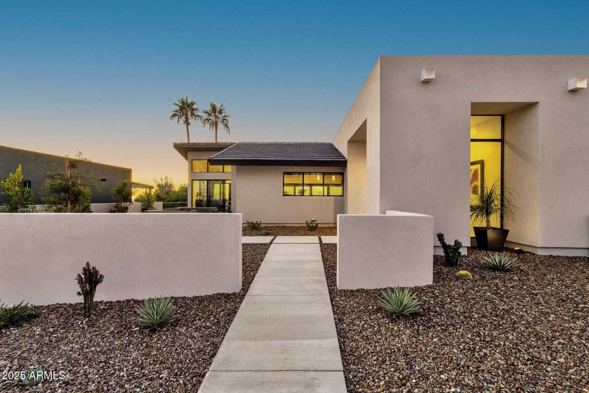 7112 North 23rd Way Phoenix, AZ 85020 - Photo 4 of 50 a view of a white house with a patio