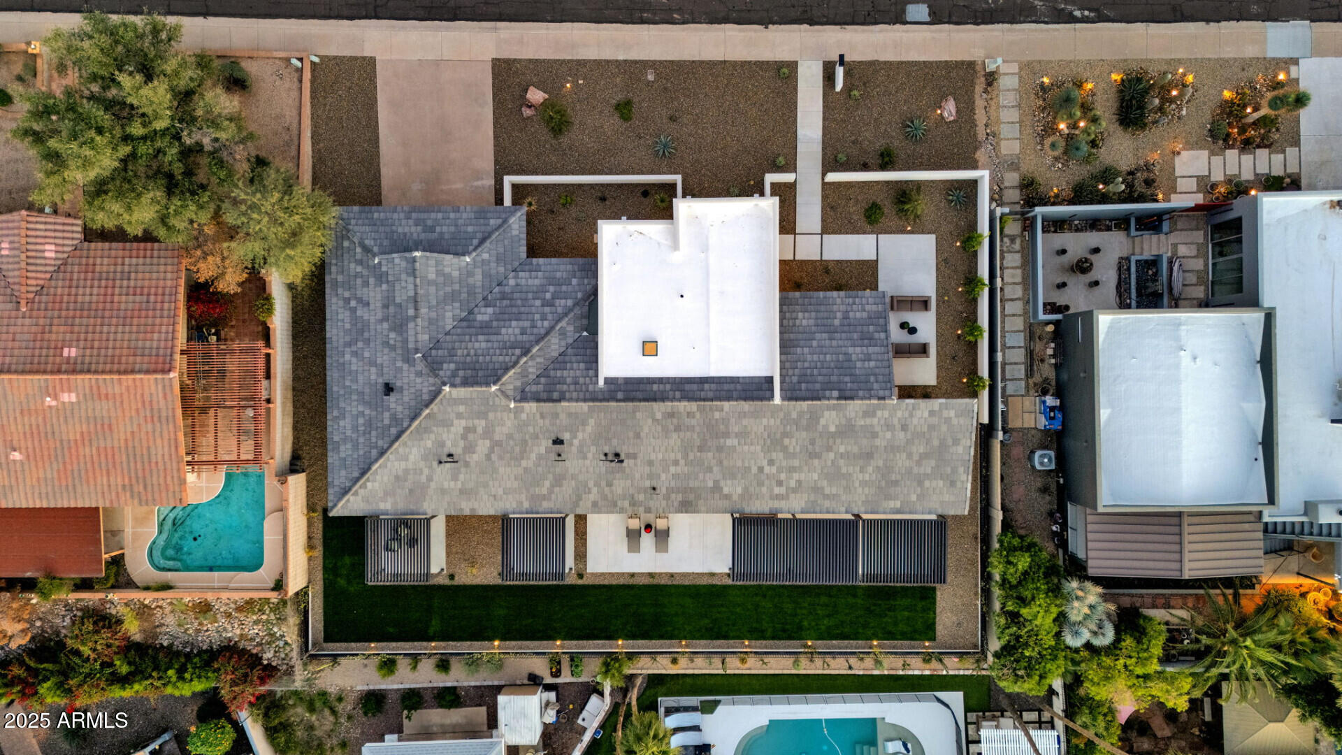 7112 North 23rd Way Phoenix, AZ 85020 - Photo 48 of 50 an aerial view of a house with a yard and large tree