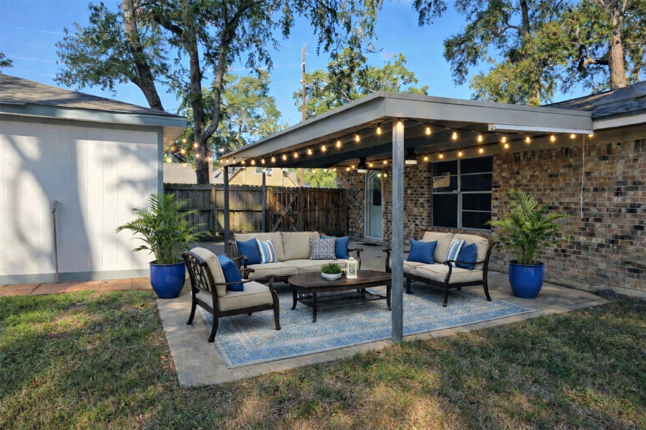 1819 Papoose Trail Crosby, TX 77532 - Photo 7 of 26 a view of a patio with couches table and chairs and potted plants