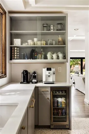 a bathroom with a granite countertop sink a toilet and a mirror