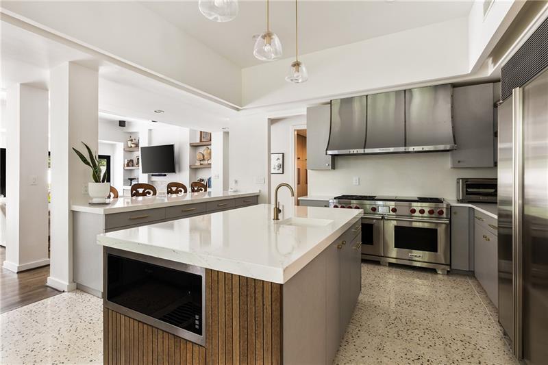9650 Coleman Road Roswell, GA 30075 - Photo 18 of 97 a kitchen with stainless steel appliances granite countertop a stove top oven a sink dishwasher and a refrigerator with wooden floor
