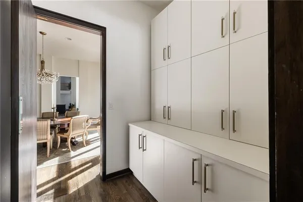 a bathroom with a glass shower door