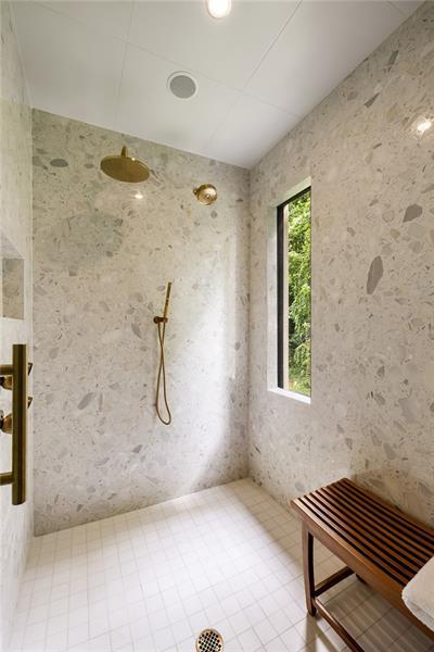 9650 Coleman Road Roswell, GA 30075 - Photo 40 of 97 a bathroom with a glass shower door