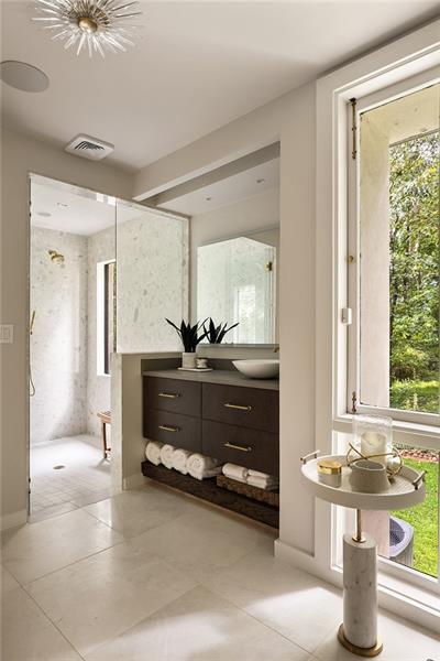 9650 Coleman Road Roswell, GA 30075 - Photo 43 of 97 a bathroom with a sink a toilet and a mirror