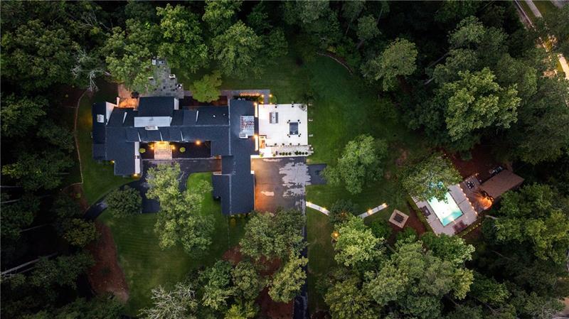 9650 Coleman Road Roswell, GA 30075 - Photo 96 of 97 an aerial view of a house with outdoor space and street view