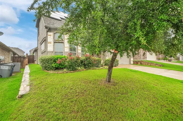 a house view with garden space