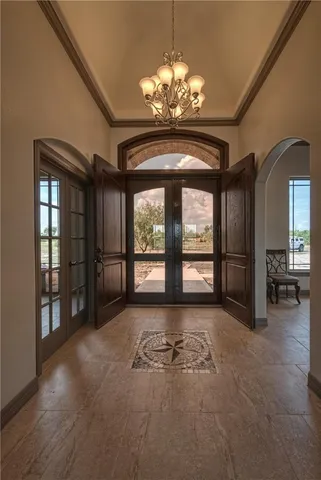 a view of a hall with dining area