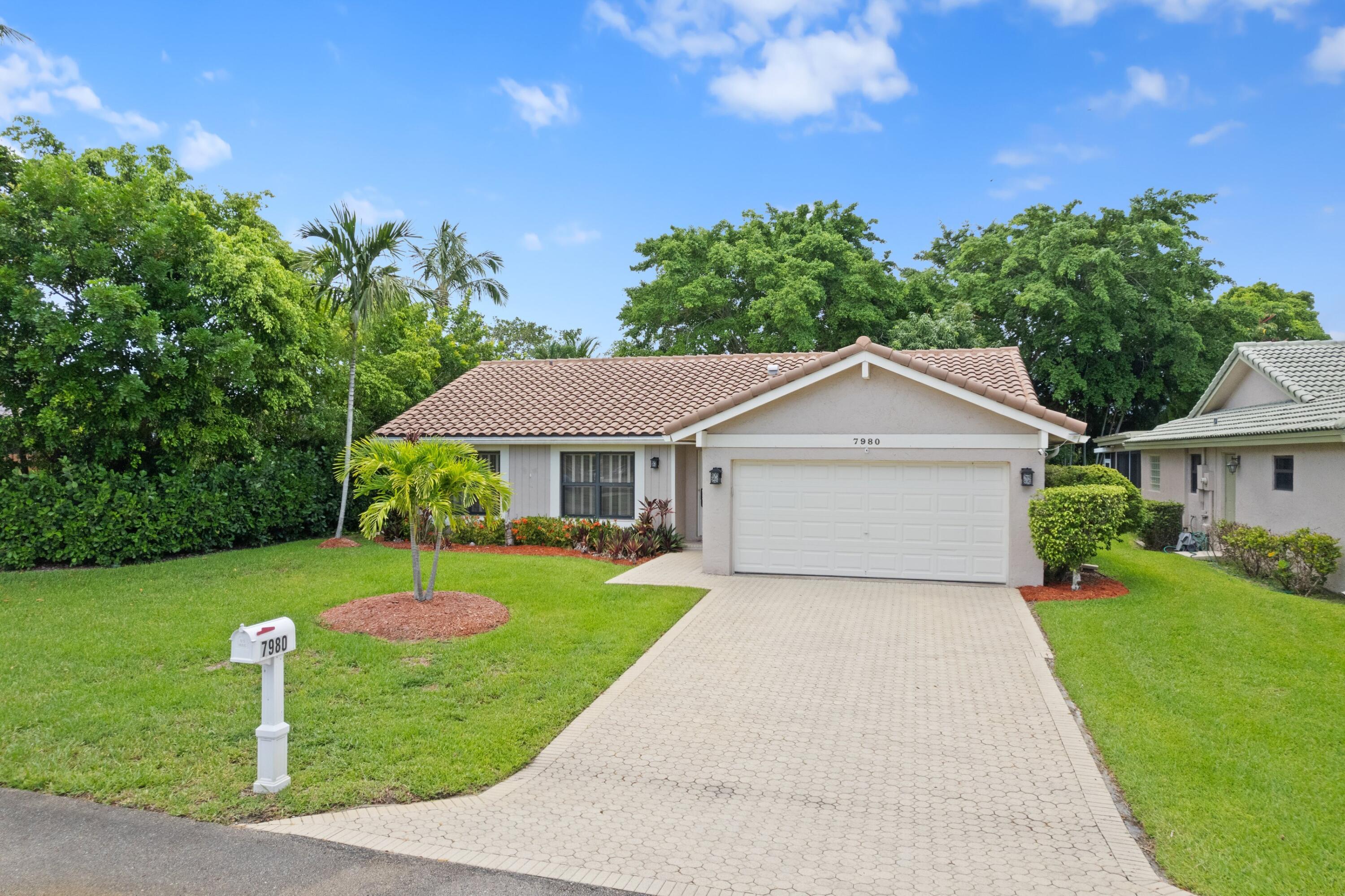 7980 Cloverfield Circle Boca Raton, FL 33433 - Photo 24 of 44 Front Exterior