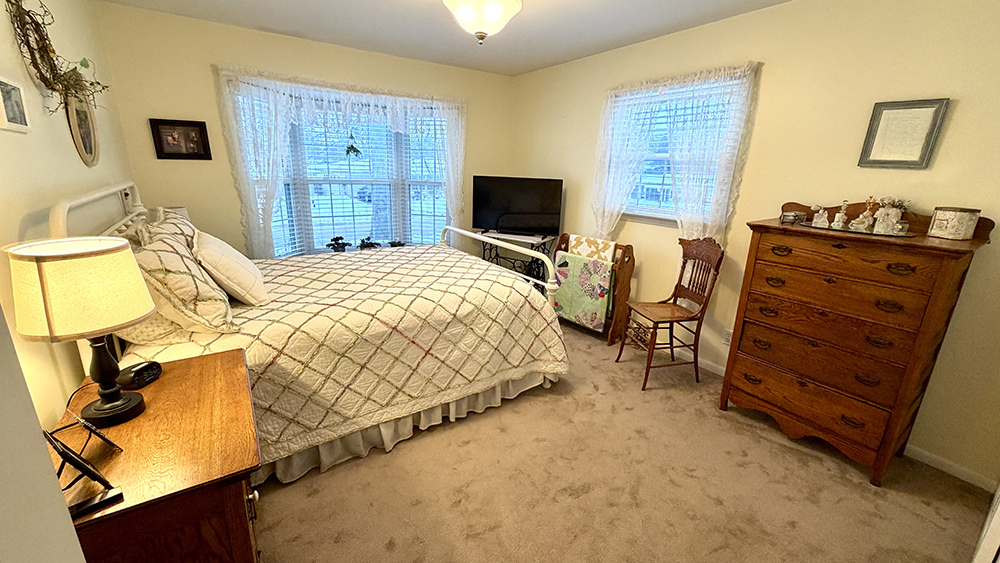 516 Christopher Street Morrison, IL 61270 - Photo 11 of 31 a bedroom with a bed and furniture