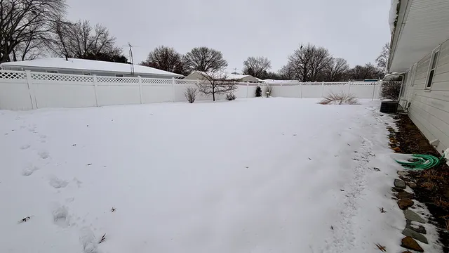 a view of roof and covered with trees