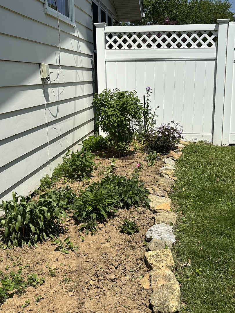 516 Christopher Street Morrison, IL 61270 - Photo 29 of 31 a view of a garden