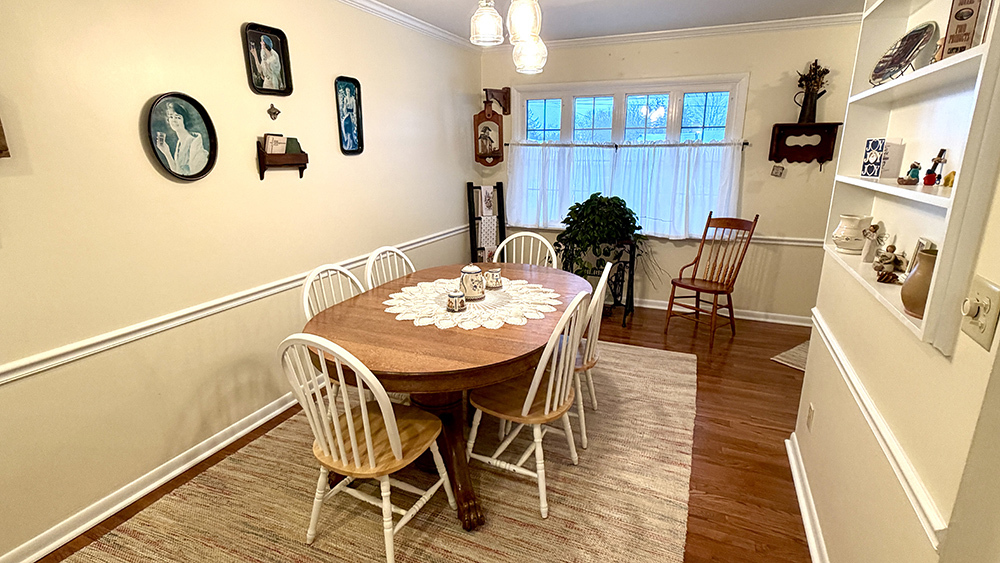 516 Christopher Street Morrison, IL 61270 - Photo 7 of 31 a view of a dining room with furniture and wooden floor