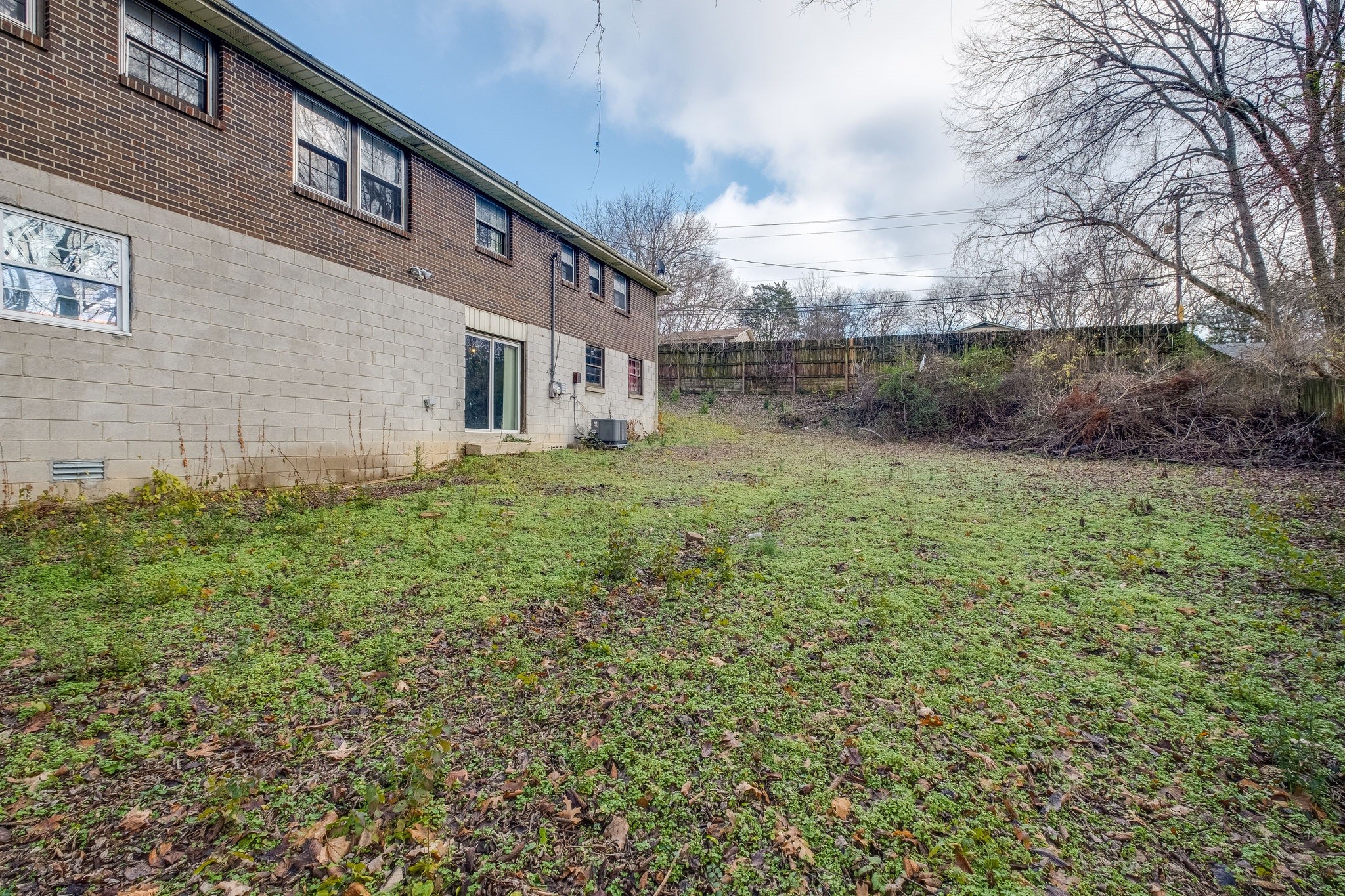 6712 Upton Lane Nashville, TN 37209 - Photo 18 of 18 a view of a house with a yard