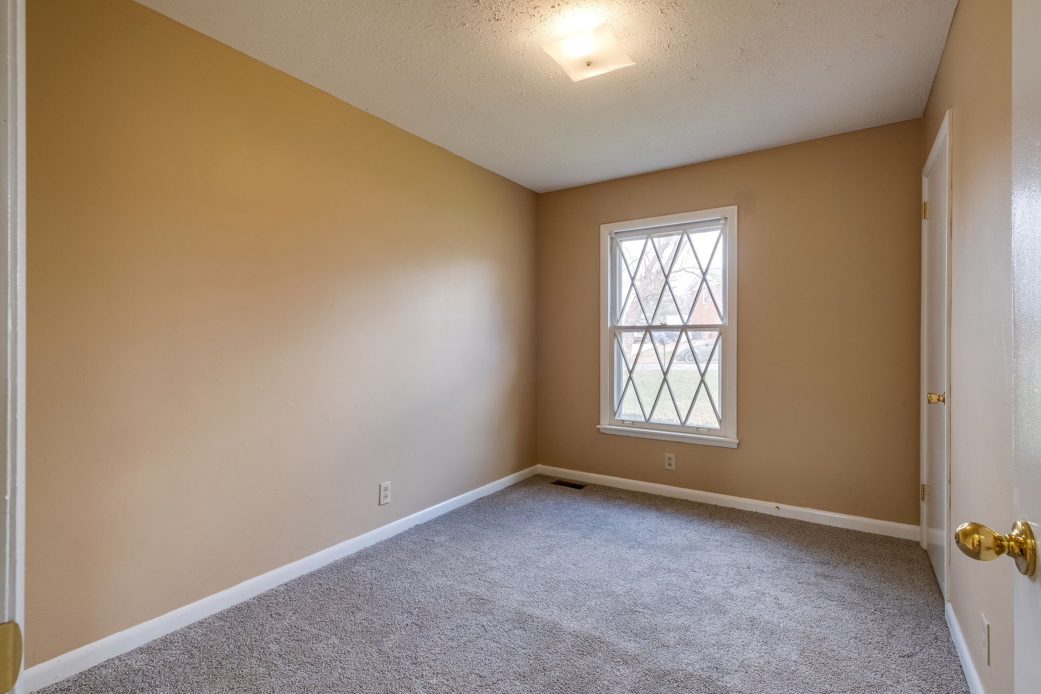 6712 Upton Lane Nashville, TN 37209 - Photo 10 of 18 an empty room with a window