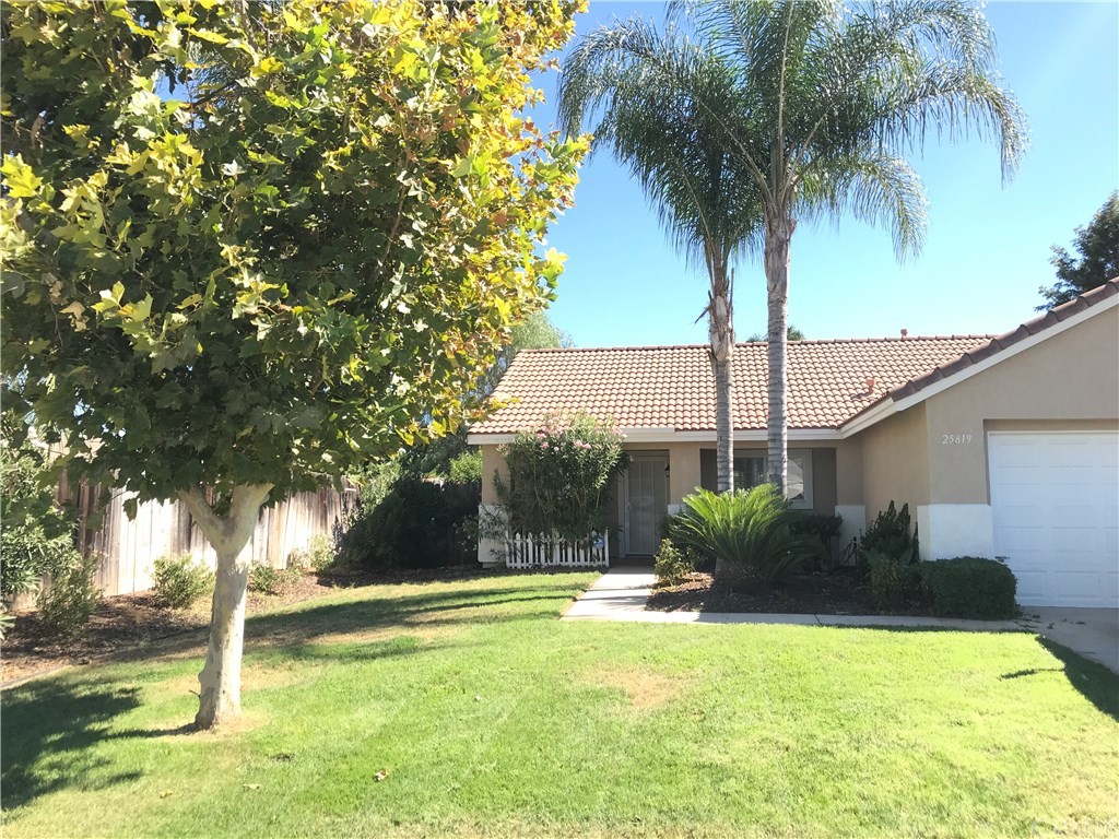 25819 Ridgemoor Road Menifee, CA 92586 - Photo 1 of 1 a front view of a house with garden
