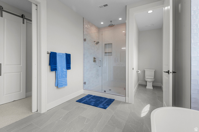 250 South Main Street, Unit 24 Alpine, UT 84004 - Photo 22 of 50 Full bathroom featuring a stall shower, a freestanding tub, and recessed lighting