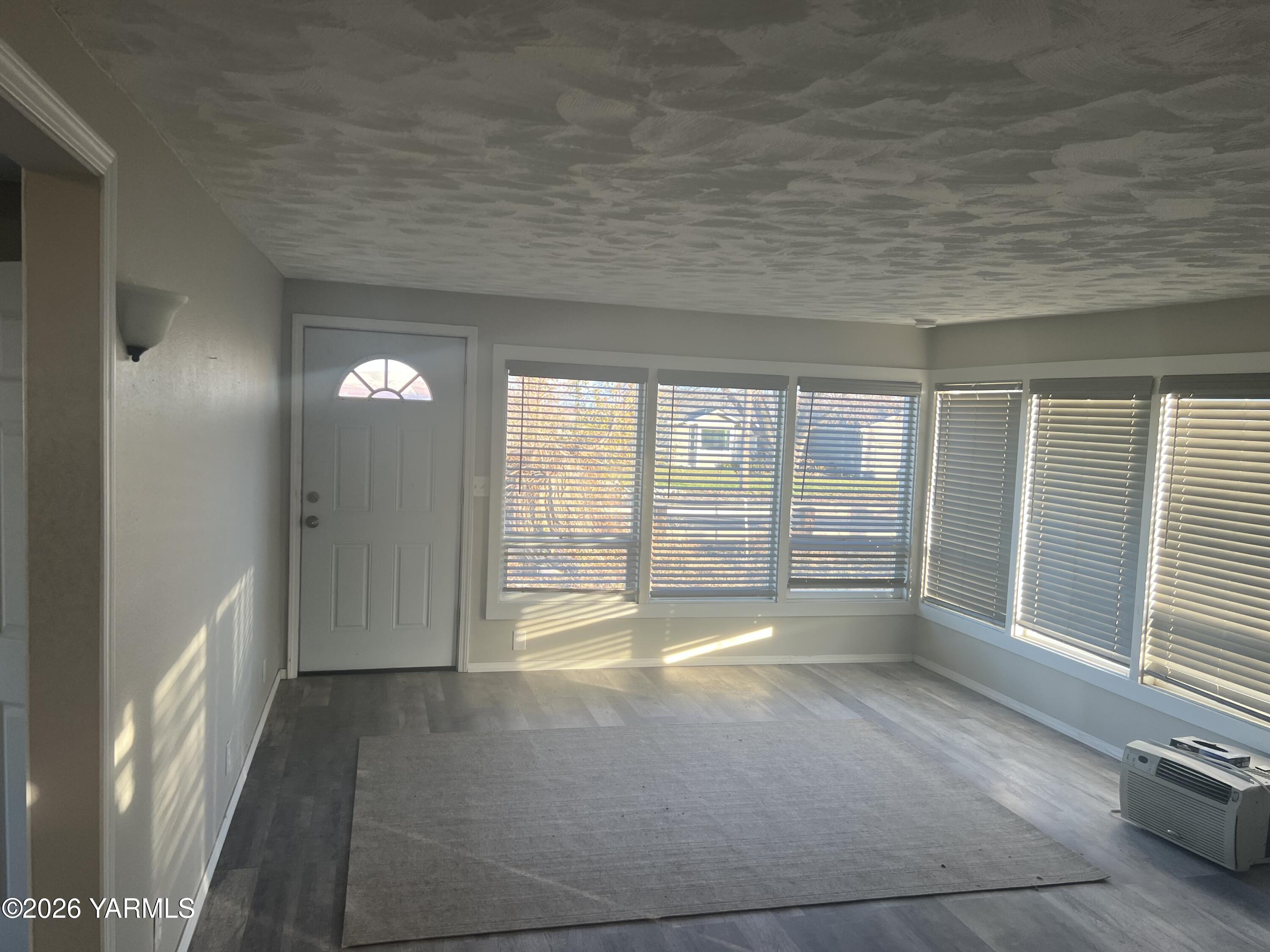 54704 North Evert Road Benton City, WA 99320 - Photo 19 of 21 a view of an empty room with a fireplace