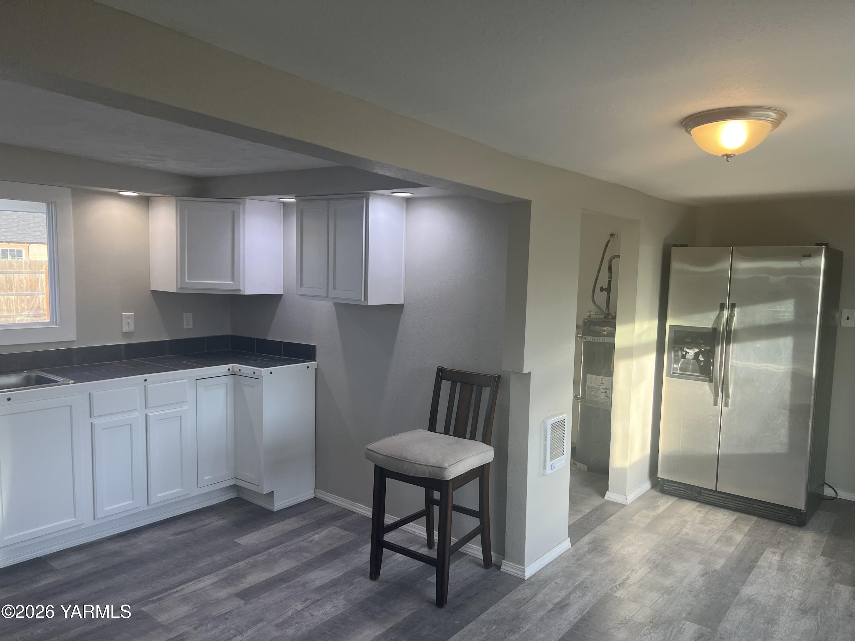 54704 North Evert Road Benton City, WA 99320 - Photo 3 of 21 a kitchen with sink and cabinets