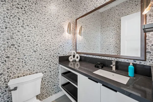 a bathroom with a sink and a toilet