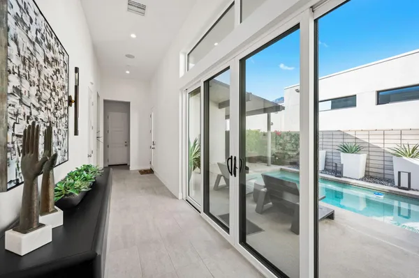 a view of a porch with a potted plant