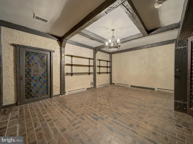 a view of a livingroom with wooden floor