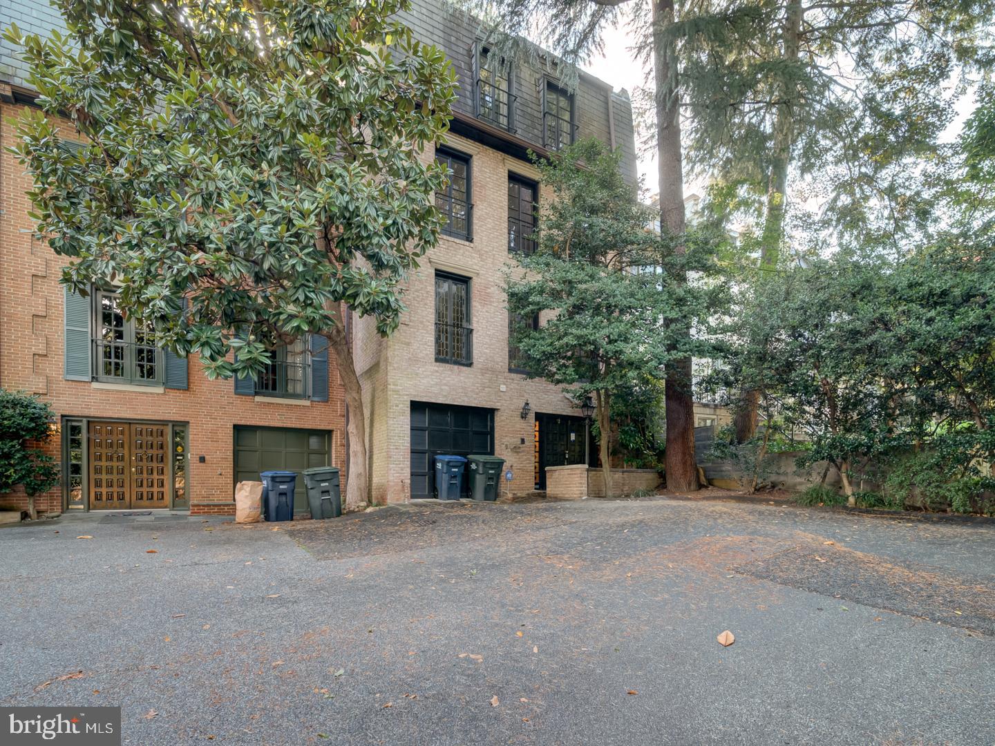 2142 Cathedral Avenue Northwest Washington, DC 20008 - Photo 2 of 60 a view of a house with a yard and large tree
