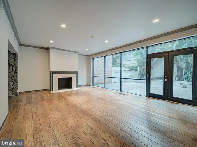 a kitchen with stainless steel appliances granite countertop a stove and a refrigerator