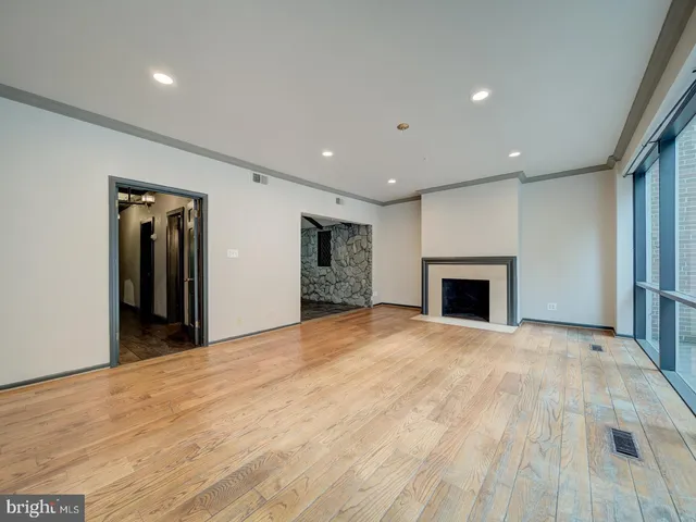 a kitchen with stainless steel appliances granite countertop a stove and a sink
