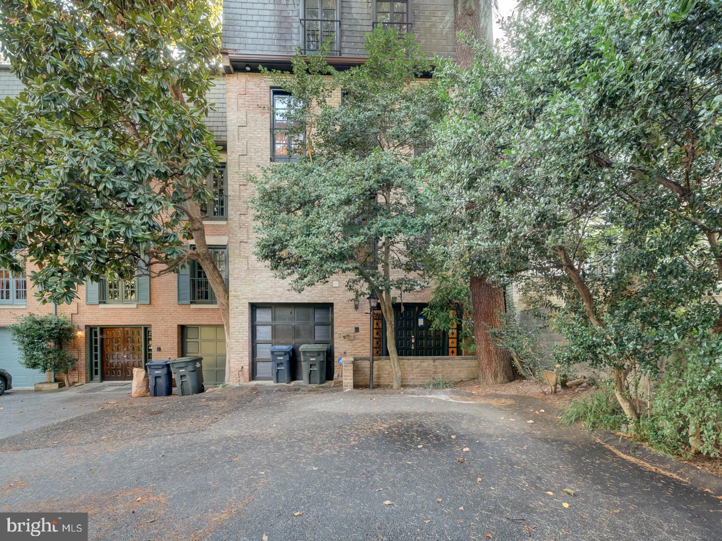 2142 Cathedral Avenue Northwest Washington, DC 20008 - Photo 3 of 60 front view of a house with a yard and a street
