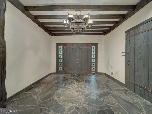 a bathroom with a mirror and a shower