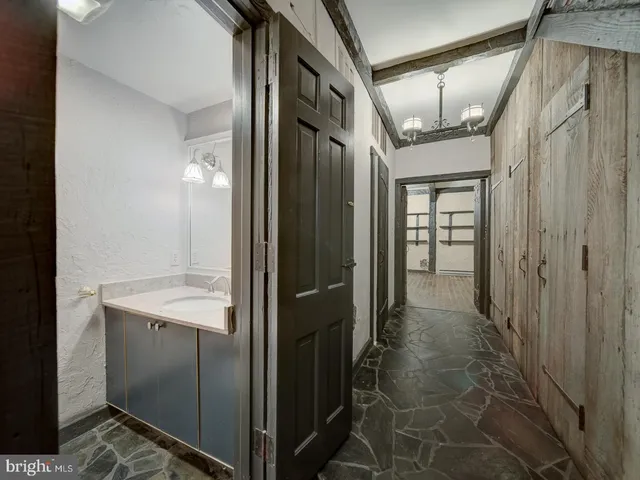 a utility room with cabinets washer and dryer