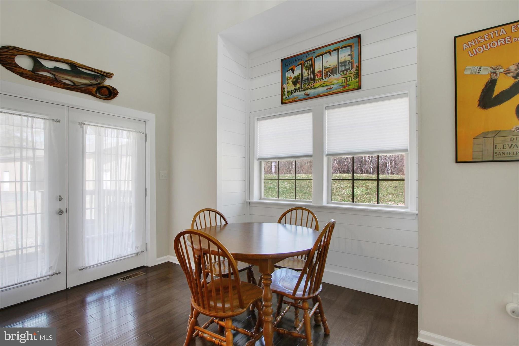 971 McGlaughlin Road Fairfield, PA 17320 - Photo 14 of 57 a view of a dining room with furniture window and wooden floor