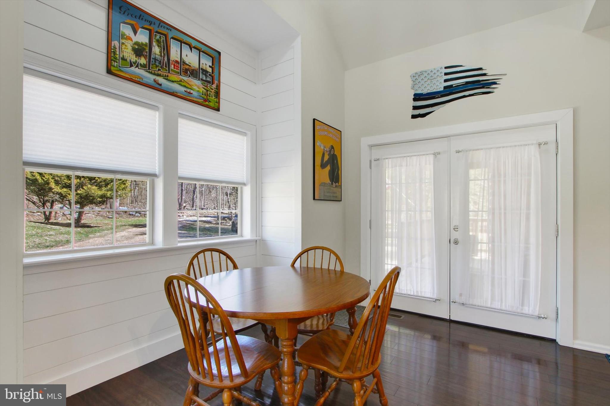 971 McGlaughlin Road Fairfield, PA 17320 - Photo 15 of 57 a view of a dining room with furniture window and wooden floor