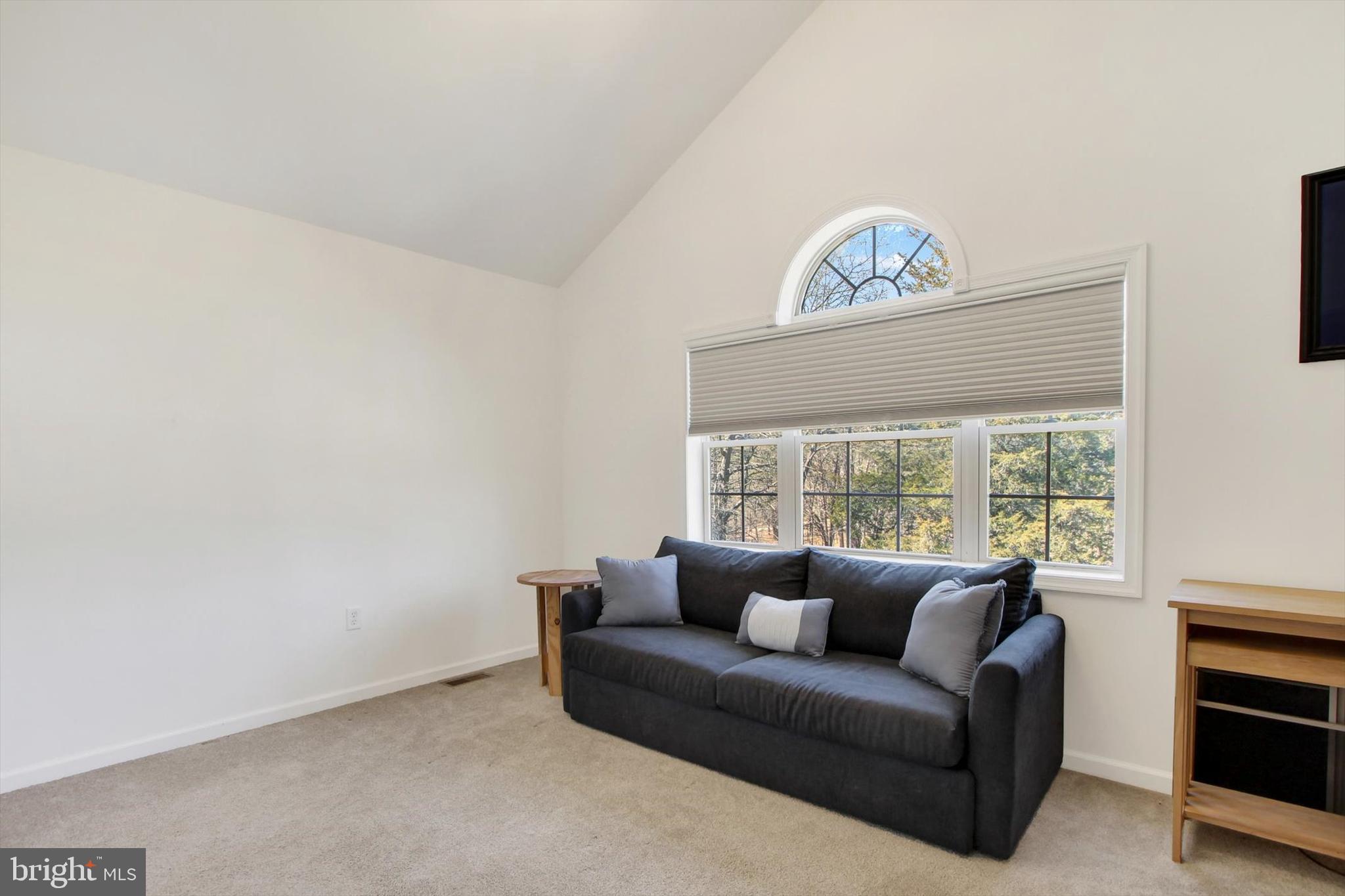 971 McGlaughlin Road Fairfield, PA 17320 - Photo 25 of 57 a living room with furniture and a large window