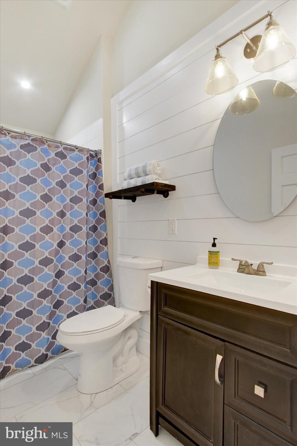 971 McGlaughlin Road Fairfield, PA 17320 - Photo 26 of 57 a bathroom with a sink a toilet and a mirror