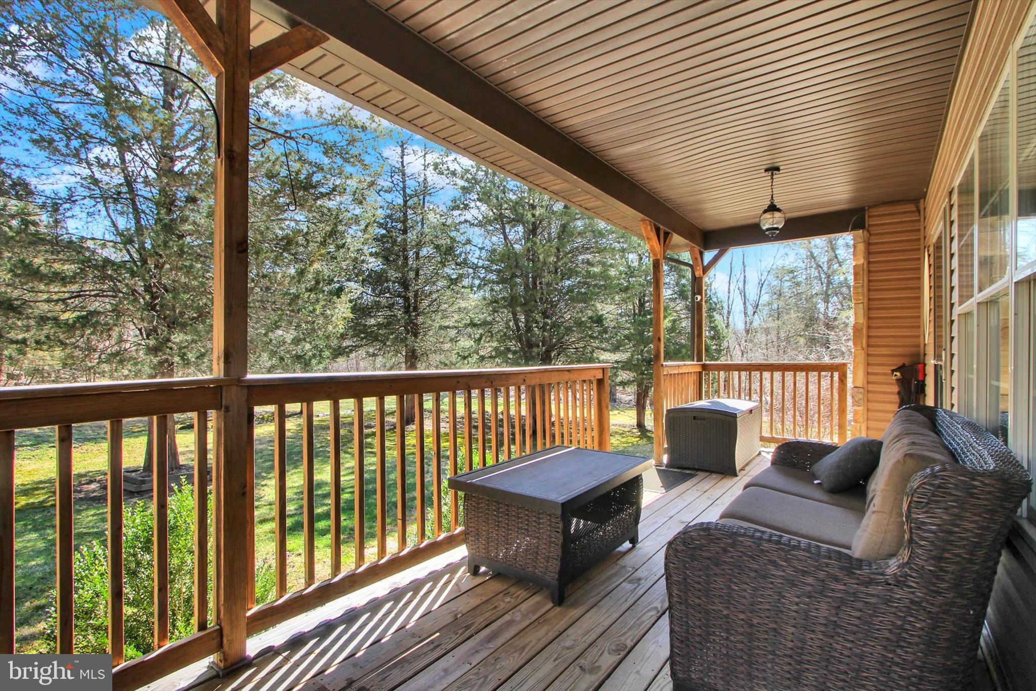 971 McGlaughlin Road Fairfield, PA 17320 - Photo 27 of 57 a balcony with furniture and wooden floor