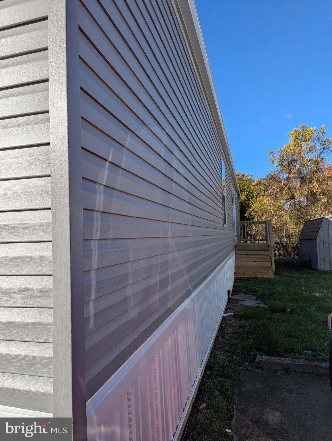 462 Mirabile Lane Baltimore, MD 21224 - Photo 2 of 12 a view of a pathway of a house with wooden fence