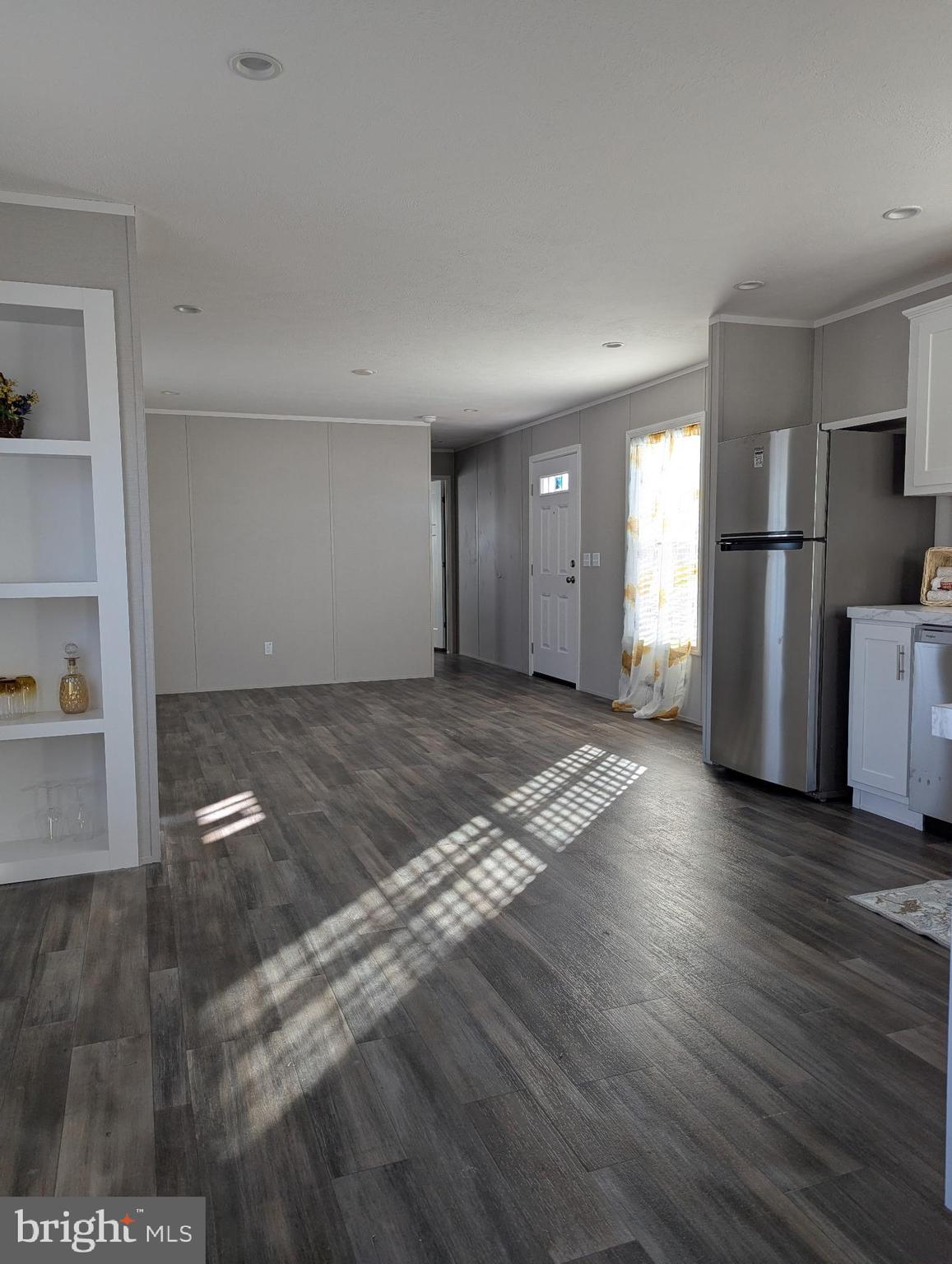 462 Mirabile Lane Baltimore, MD 21224 - Photo 3 of 12 a view of a hall with wooden floor
