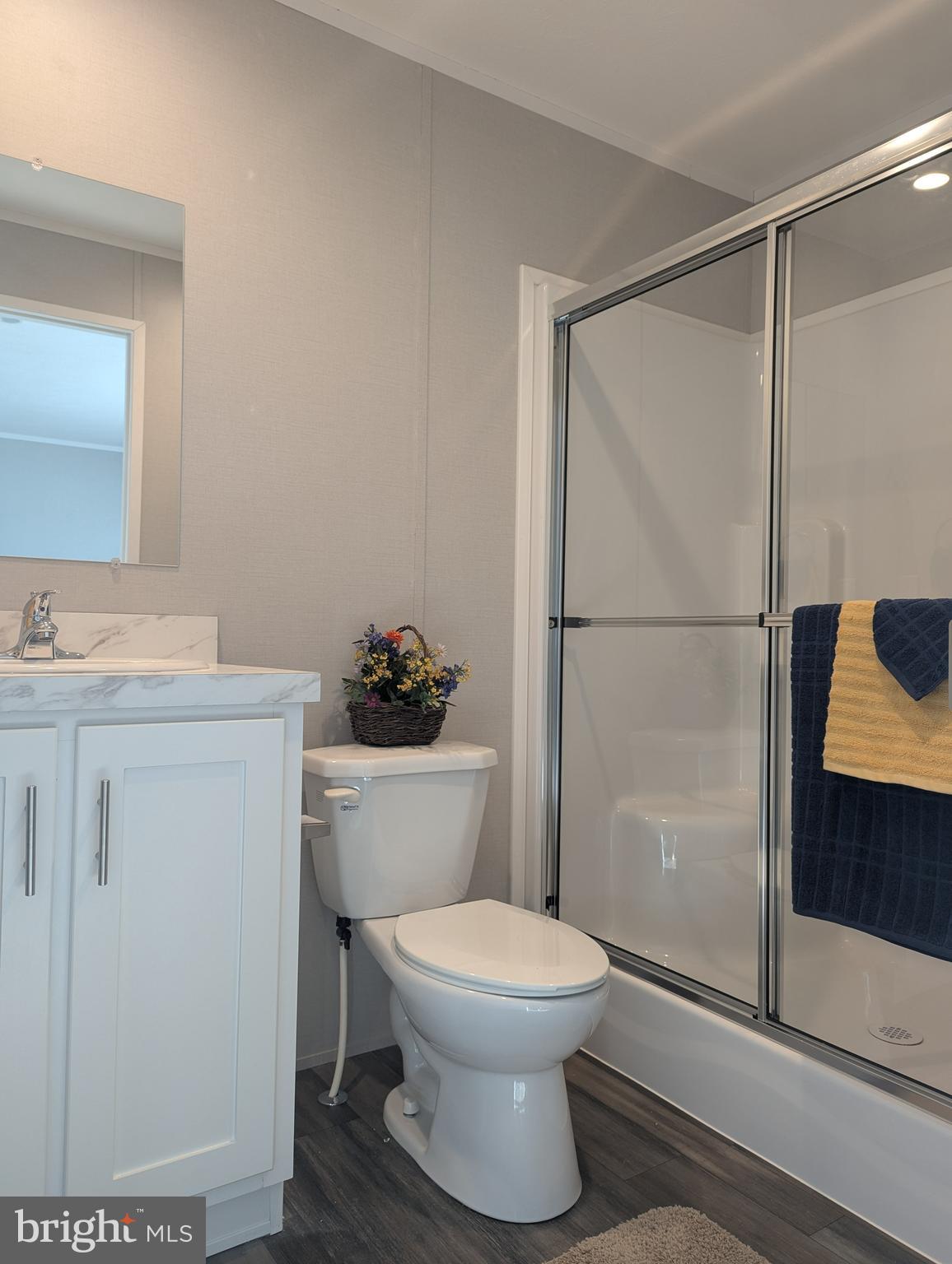 462 Mirabile Lane Baltimore, MD 21224 - Photo 10 of 12 a bathroom with a toilet sink and shower