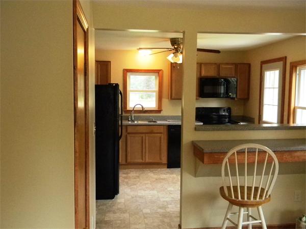 228 Gage Road Athol, MA 01331 - Photo 3 of 23 a kitchen with stainless steel appliances granite countertop a refrigerator a stove and a sink