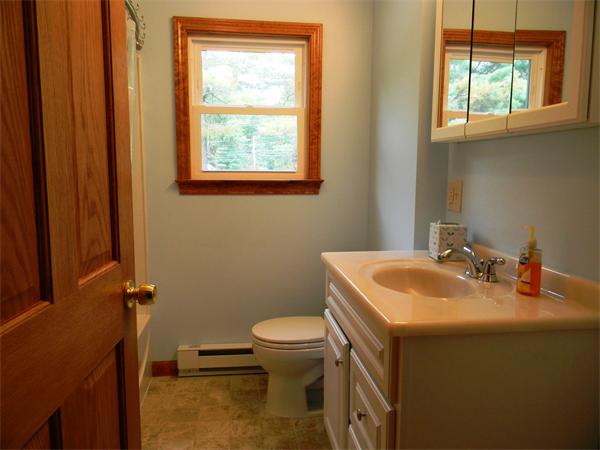 228 Gage Road Athol, MA 01331 - Photo 10 of 23 a bathroom with a sink a toilet and a window