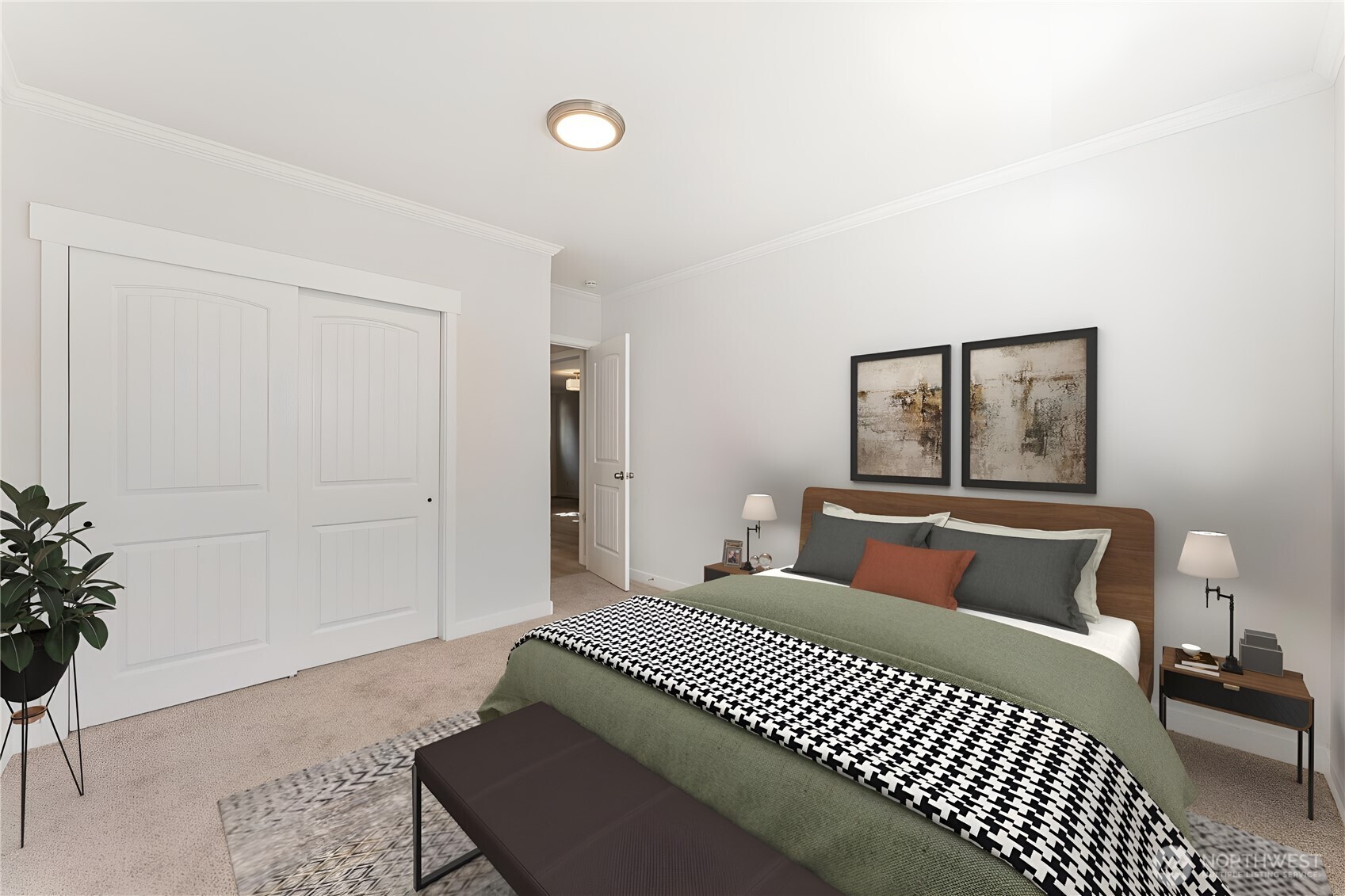 1616 11th Street Bremerton, WA 98337 - Photo 22 of 33 a bedroom with a large bed and a potted plant